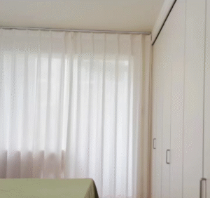 Blackout-Compatible Tracks vs. Sheer Tracks: Privacy vs. Light Control in Hotels?