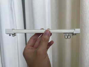 How Curtain Track Materials (Aluminum vs. Plastic vs. Steel) Affect Performance？