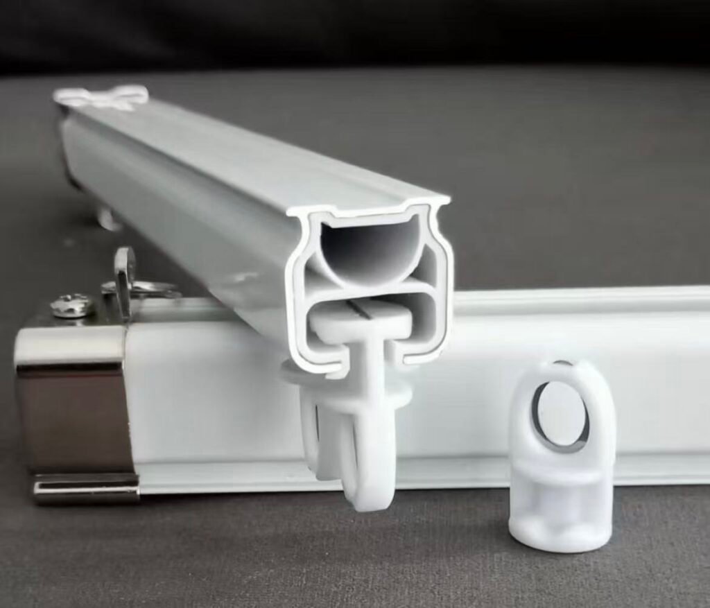 A close-up cross-section of an aluminum track, with callouts for wall thickness and alloy grade.