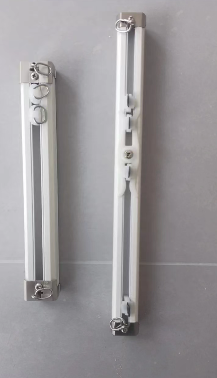 Double Curtain Track System in Hotel A hotel window with a neatly installed double curtain track system, one for sheers and one for blackouts.