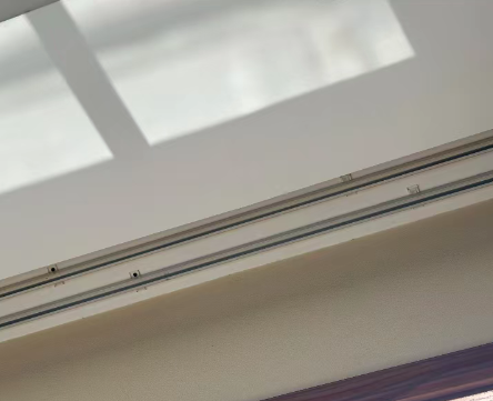 architects reviewing curtain track plans