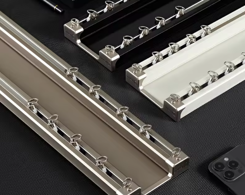 Factory Pre-Cut vs. On-Site Cutting of Curtain Tracks An image showing a stack of perfectly cut, room-labeled curtain tracks ready for installation, contrasted with an image of an installer manually cutting a track on-site.