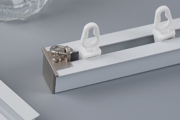 Durable virgin aluminum bar for curtain tracks, featuring eco-certification badges and recyclability symbols highlighting long-term sustainability.